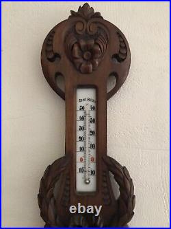 Ancien baromètre /thermomètre en bois sculpté