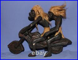 Ancien couple de statuettes africaines en bois sculpté à la main