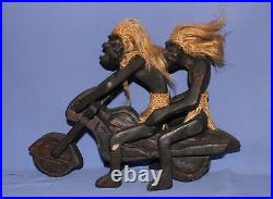 Ancien couple de statuettes africaines en bois sculpté à la main