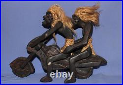 Ancien couple de statuettes africaines en bois sculpté à la main