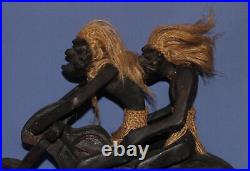 Ancien couple de statuettes africaines en bois sculpté à la main