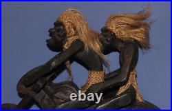 Ancien couple de statuettes africaines en bois sculpté à la main