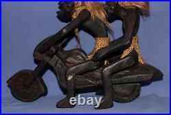 Ancien couple de statuettes africaines en bois sculpté à la main