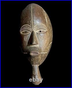 Ancien masque facial en bois sculpté à la main art tribal africain African Gu