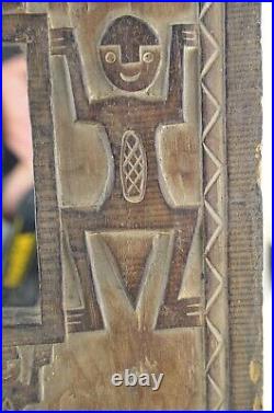 Ancien miroir d'art africaine, cadre en bois sculpté à la main