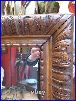 Ancien miroir glace en bois sculpté de godrons epoque XIXe style renaissance