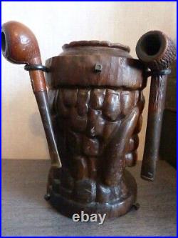 Ancien pot a tabac en bois sculpté a décors de visage avec 3 pipes (ch)