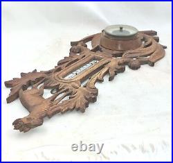 Ancien thermomètre de baromètre de chasse en bois sculpté motif forêt noire