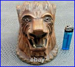 Ancienne boite à cigarettes lion en bois sculpté foret noir