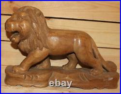 Ancienne figurine lion en bois sculpté à la main