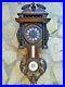 Ancienne-horloge-pendule-en-bois-sculpte-complete-avec-sa-clef-balancier-01-nw