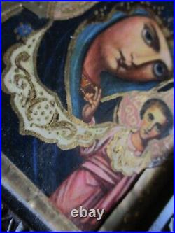 Ancienne icone peinture et laiton vierge et l enfant dans cadre bois sculpté
