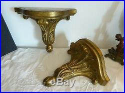 Ancienne paire de console d'applique en bois doré sculpté