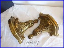 Ancienne paire de console d'applique en bois doré sculpté