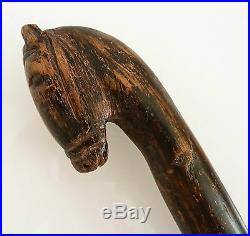 Asie bâton ancien avec pommeau sculpté d'une tête de cheval