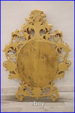 Miroir ancien bois sculpté et doré XVIIIème siècle