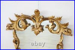 Miroir ancien en bois sculpté doré à la feuille d'or 19ème siècle